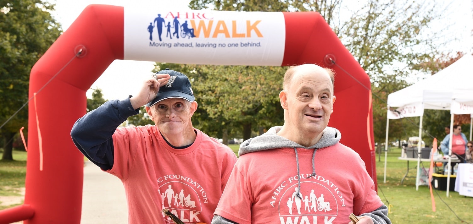 Two men walk at the AHRC Foundwation Walk