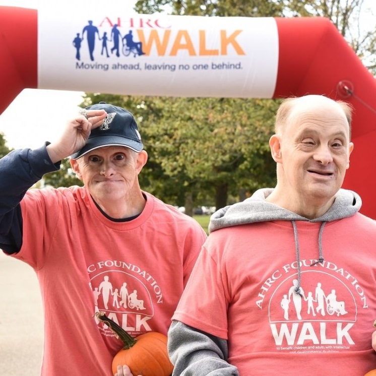 Two men walk at AHRC Foundation Walk Event